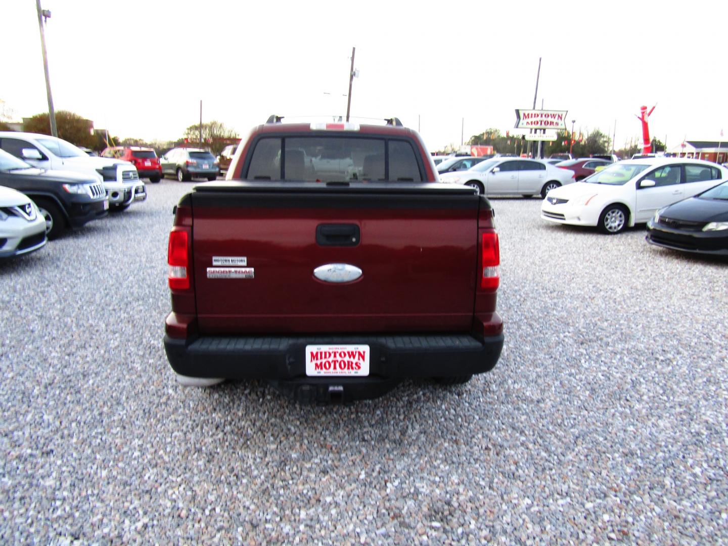 2010 Bronze /Tan Ford Explorer Sport Trac XLT 4.0L 2WD (1FMEU3BE3AU) with an 4.0L V6 SOHC 12V engine, Automatic transmission, located at 15016 S Hwy 231, Midland City, AL, 36350, (334) 983-3001, 31.306210, -85.495277 - Photo#6